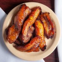 Maduros · Fried SweetPlantains or
Tostones Green Plantains
specify which one