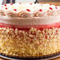 Rasp White Choc Mousse Slice · Moist white cake filled with white chocolate mousse and raspberry topped and decorated with ...