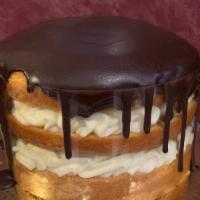 Boston Cream Cake · Please note: most cakes require a 48 hour notice. Moist yellow cake layers filled with vanil...