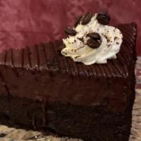 Cappuccino Cake Wedge · Chocolate chiffon cake layers filled with a rich cappuccino mousse and covered in chocolate ...