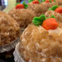 Carrot Cupcake · Carrot cake layers cream cheese frosting walnuts