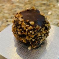 Turtle Cheesecake Truffles · ***Sold per Pound ~ About 10-12 Truffles per Pound***
Bite-sized Turtle cheesecake, dipped i...