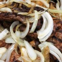 Carne Asada / Roasted Meat · Servidos con gallo pinto o arroz blanco, ensalada. Tortilla o maduro. / Served with gallo pi...