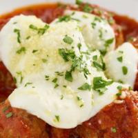Nonna'S Meatballs · Homemade meatballs topped with homemade marinara and whipped ricotta. Served with two bread ...