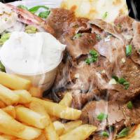 Lamb Gyro Platter · Served with Greek salad, fries and pita bread.