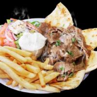 Falafel Platter · Served with Greek salad, fries and pita bread.