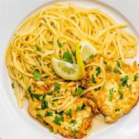 Chicken Francese · Egg battered, sautéed with lemon herbs, butter and white wine sauce, served over pasta.
