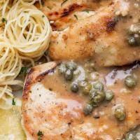 Chicken Piccata · Sautéed chicken breast with capers and white wine sauce, served over pasta.