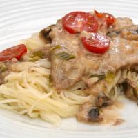 Veal Marsala · Sautéed with mushrooms and marsala wine sauce, served over pasta.