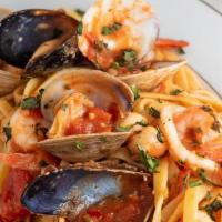 Frutti Di Mare · Shrimp, mussels, clams and calamari in a light fra diavolo, served over pasta.
