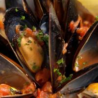 Mussels Or Clams Fra Diavolo · Steamed mussels or clams in a spicy marinara sauce, topped with pasta.