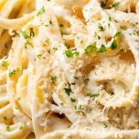 Fettuccine Alfredo · Fettuccine pasta with our homemade alfredo sauce. Add chicken and shrimp for an additional c...