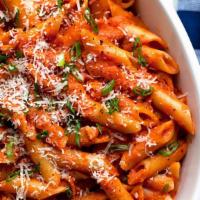 Penne Alla Vodka · Penne pasta with a delicious pink sauce. Add chicken and shrimp for an additional charge.