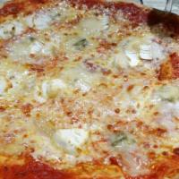 Quattro Formaggi · Four cheese pizza - mozzarella, Parmesan, ricotta and Gorgonzola.