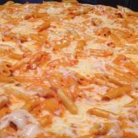 Penne Alla Vodka Pizza · Penne alla vodka over a thin and crispy crust topped with mozzarella cheese.