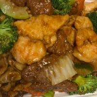 Triple Delight · Jumbo shrimp, chicken, beef sautéed with mixed vegetable in special brown sauce.