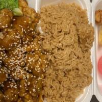 Sesame Chicken · Served with fried rice.