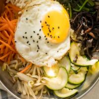 Bibimbap · Spicy. Rice mixed with vegetables, meat, egg and chili pepper paste.