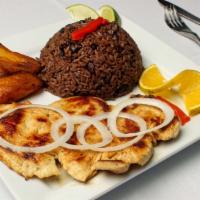 Chicken Breast (Pechuga De Pollo) · Served with two sides.