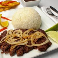 Fried Shredded Beef (Vaca Frita) · Served with two sides.