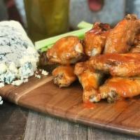 Oven Baked Wings 12Pc · Our wings are baked and crisped up in our oven and finished with your choice of sauce: Naked...