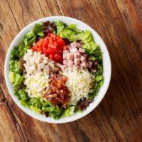 Chopped Cobb Salad · mixed greens, ham, grilled chicken, egg, bacon, mozzarella, tomatoes, crostini and your choi...