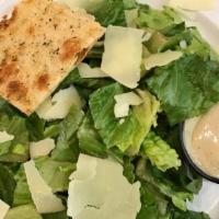 Caesar Side Salad · romaine lettuce, crostinis, parmesan cheese and homemade caesar dressing