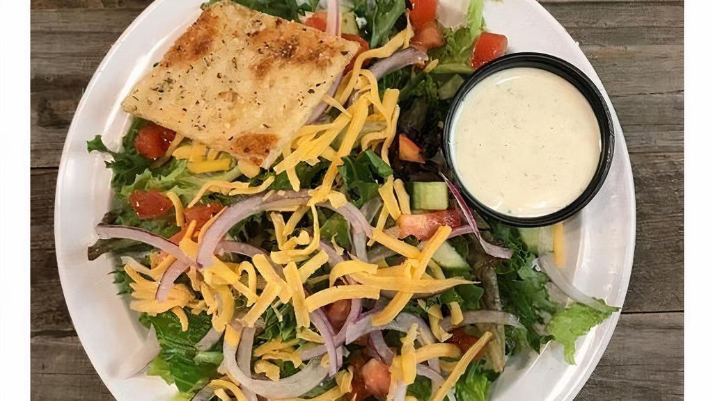 Garden Side Salad · mixed greens, crostini, roma tomatoes, cucumbers, red onions, cheddar cheese and dressing of your choice