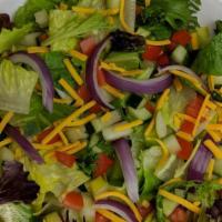 Garden Salad · Mixed greens, roma tomatoes, cucumbers, red onions, cheddar cheese, crostini and dressing of...