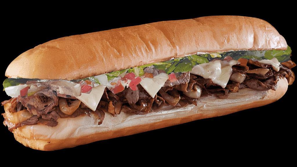 Works Cheesesteak Steak · Philly steak served with grilled onions, sautéed mushrooms, and green peppers with melted Swiss American cheese,  fresh crisp lettuce and vine ripe tomatoes and mayonnaise.