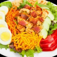 Grilled Chicken Club Salad · Fresh mixed greens, tomatoes, sliced cucumbers, shredded carrots, egg, shredded Cheddar, gri...