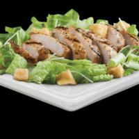 Chicken Caesar Salad · Caesar salad topped with grilled chicken breast.