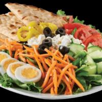 Greek Salad · Our unique garden salad, mixed with feta cheese, black olives, green peppers, and banana pep...
