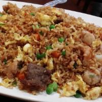 House Fried Rice (Regular Size) · Includes Beef, Chicken, Shrimp and assorted Veggies.