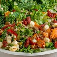 Kale & Roasted Veggie Salad · Kale, roasted veggies, feta cheese, goji berries, roasted pumpkin seeds with raspberry balsa...