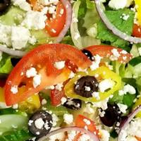 Greek · Romaine with cucumbers, red onions, tomatoes, banana peppers, black olives and crumbled feta