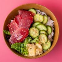 Tuna Sashimi Rice Bowl · Freshly sliced tuna sashimi over sushi rice with sliced cucumber, radish, ginger, crunchy gr...