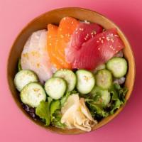 Chirashi Combo Rice Bowl · Freshly sliced tuna, salmon, and yellowtail sashimi over sushi rice with sliced cucumber, ra...