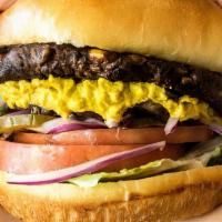Southwest Black Bean Burger · Black bean and corn patty, romaine lettuce, tomato, red onions, pickles, sauteed mushrooms a...