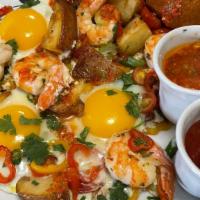 Shrimp Omelet · 3 eggs with homemade potatoes, tomatoes, onion, sweet pepper, garlic and shrimps.