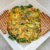 Power Omelette · 3 Free-range eggs, spinach, kale, red bell peppers, onions, chia seeds, hemp seeds, and orga...