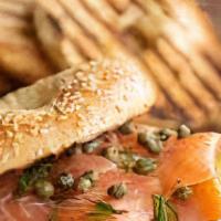 Smoked Salmon Bagel · Organic sprouted grain bagel, cream cheese, smoked salmon, organic mixed greens, tomatoes, c...