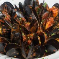 Mussels Marinara · 1 lb. of sautéed mussels in a spicy garlic white wine pomodoro sauce garnished with toasted ...