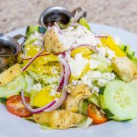 Greek Artichoke Salad · Mixed greens with marinated artichoke hearts, tomatoes, cucumbers, banana peppers, red onion...