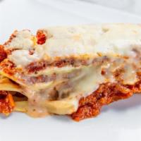 Beef Lasagna · Oven baked layered ricotta, meat sauce and mozzarella, cheese in our marinara sauce topped w...