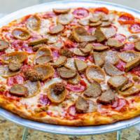 Meat O Mania · The meat lovers: pepperoni, Italian sausage, ground beef, ham and homemade sliced meatballs.