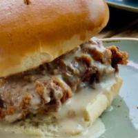 Dirty South Country Fried Chicken Sandwich · Pepper gravy.