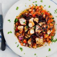 Grilled Octopus · Char-grilled splashed with extra virgin olive oil, diced tomatoes, diced onions, balsamic vi...