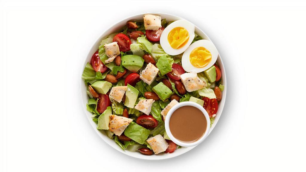 California Cobb · Extra Crisp Romaine, Oven Roasted Chicken, Hass Avocado, Cage-free Jammy Egg, Sliced Grape Tomatoes, Chopped Almonds, Balsamic Vinaigrette (Homemade)