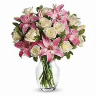 Always A Lady · A romantic gift like this one is always appreciated. An eye-catching display of roses and li...